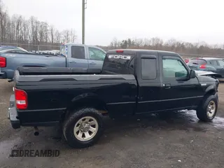 2007 Ford Ranger STX z VIN 1FTYR44U57PA83102, wystawiony jako IAAI lot #41776895 z przebiegiem 209 165 mil mil oraz . Historia ofert i sprzedaży dostępna na DreamBid. Obrazek 13.