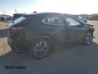 2023 Lexus UX 250h Premium с VIN JTHP9JBH8P2069805, выставлен на аукционе Copart как лот 87671095 с пробегом 12 599 миль миль и Списание • Salvage title. История ставок и продаж доступна на DreamBid. Изображение 3.