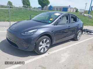 2023 Tesla Model Y Long Range z VIN 7SAYGDEE1PA158661, wystawiony jako IAAI lot #41983897 z przebiegiem 20 176 mil mil oraz . Historia ofert i sprzedaży dostępna na DreamBid. Obrazek 21.