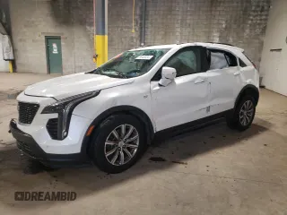 2022 Cadillac XT4 AWD Sport с VIN 1GYFZFR49NF106549, выставлен на аукционе Copart как лот 73946334 с пробегом 19 966 миль миль и Списание • Salvage title. История ставок и продаж доступна на DreamBid. Изображение 1.