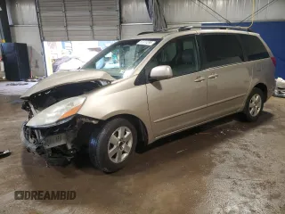 2009 Toyota Sienna XLE with VIN 5TDZK22C19S228023, listed as a Copart auction lot 57072295 with 148,080 mi miles and Salvage title. Bid and sale history available at DreamBid. Image 1.