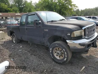 2000 Ford F-250 XL с VIN 1FTNX21L7YEC94100, выставлен на аукционе Copart как лот 58923025 с пробегом 199 015 миль миль и Списание • Salvage title. История ставок и продаж доступна на DreamBid. Изображение 4.