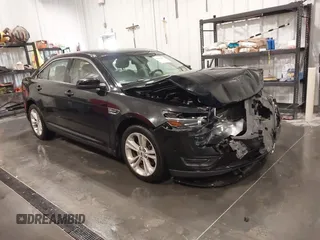 2016 Ford Taurus SEL z VIN 1FAHP2H83GG143679, wystawiony jako IAAI lot #42168483 z przebiegiem 169 834 mil mil oraz . Historia ofert i sprzedaży dostępna na DreamBid. Obrazek 1.