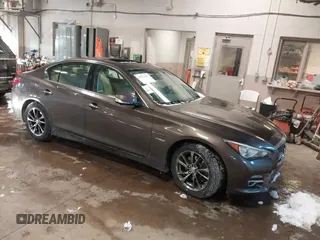 2014 Infiniti Q50 Hybrid Premium with VIN JN1AV7AR3EM702182, listed as a IAAI auction lot 41577667 with 61,599 mi miles. Bid and sale history available at carsss.com. Image 1.