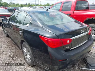 2014 Infiniti Q50 Premium z VIN JN1BV7AR4EM695666, wystawiony jako IAAI lot #42437594 z przebiegiem 141 008 mil mil oraz . Historia ofert i sprzedaży dostępna na DreamBid. Obrazek 3.