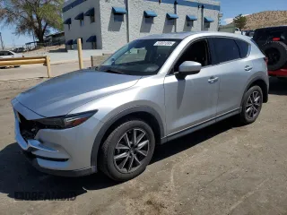 2018 Mazda CX-5 Grand Touring with VIN JM3KFBDM3J0319157, listed as a Copart auction lot 53891095 with 133,189 mi miles and Salvage Title. Bid and sale history available at DreamBid. Image 1.