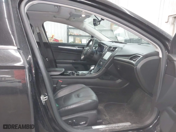 2015 Ford Fusion Titanium Hybrid with VIN 3FA6P0RU2FR309074, listed as a IAAI auction lot 41240630 with 172,025 mi miles. Bid and sale history available at carsss.com. Image 5.