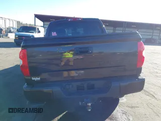 2020 Toyota Tundra Limited with VIN 5TFFY5F1XLX256495, listed as a IAAI auction lot 41373252 with 142,229 mi miles and . Bid and sale history available at DreamBid. Image 16.