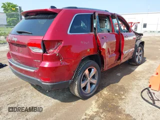 2014 Jeep Grand Cherokee Limited with VIN 1C4RJFBTXEC115239, listed as a IAAI auction lot 42352872 with 51,422 mi miles and . Bid and sale history available at DreamBid. Image 4.
