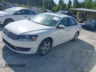 2013 Volkswagen Passat SE w/Sunroof with VIN 1VWBH7A30DC042088, listed as a IAAI auction lot 41990809 with 126,590 mi miles. Bid and sale history available at carsss.com. Image 2.