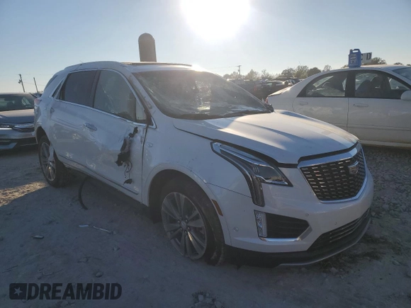2024 Cadillac XT5 FWD Premium Luxury with VIN 1GYKNCRS7RZ740471, listed as a Copart auction lot 82275174 with 14,747 mi miles and Salvage Title. Bid and sale history available at carsss.com. Image 4.