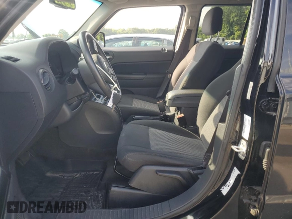 2014 Jeep Patriot Latitude with VIN 1C4NJRFB8ED717276, listed as a Copart auction lot 62717775 with 108,933 mi miles and Salvage title. Bid and sale history available at DreamBid. Image 7.