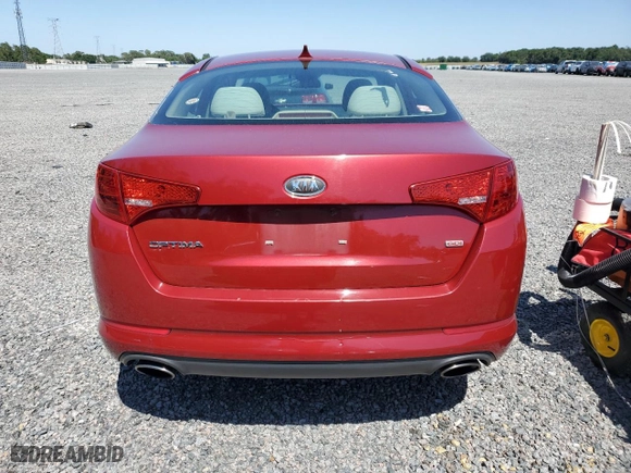 2012 Kia Optima LX with VIN 5XXGM4A72CG074898, listed as a Copart auction lot 52913115 with 142,705 mi miles and Salvage Title. Bid and sale history available at carsss.com. Image 6.
