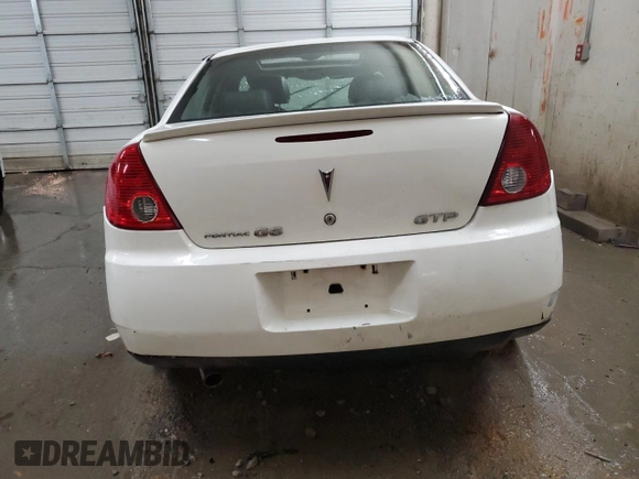 2006 Pontiac G6 GTP z VIN 1G2ZM551164140185, wystawiony jako Copart lot #82346974 z przebiegiem Nie podano mil oraz Szkoda całkowita • Salvage title. Historia ofert i sprzedaży dostępna na DreamBid. Obrazek 6.