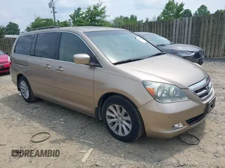 2005 Honda Odyssey Touring z VIN 5FNRL388X5B032666, wystawiony jako IAAI lot #42512755 z przebiegiem 211 326 mil mil oraz . Historia ofert i sprzedaży dostępna na DreamBid. Obrazek 1.