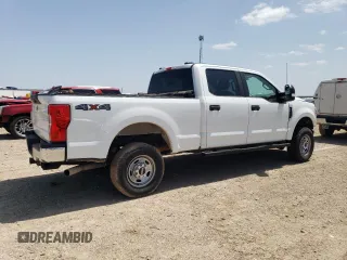 2022 Ford F-250 XL with VIN 1FT7W2B64NEE68639, listed as a Copart auction lot 52580315 with 138,784 mi miles and Salvage title. Bid and sale history available at DreamBid. Image 3.