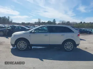 2013 Lincoln MKX with VIN 2LMDJ8JK1DBL16203, listed as a IAAI auction lot 42037185 with 219,567 mi miles. Bid and sale history available at carsss.com. Image 14.