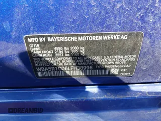 2020 BMW 3 Series 330i with VIN WBA5R1C06LFH38996, listed as a IAAI auction lot 41664442 with Not Provided miles and . Bid and sale history available at carsss.com. Image 9.