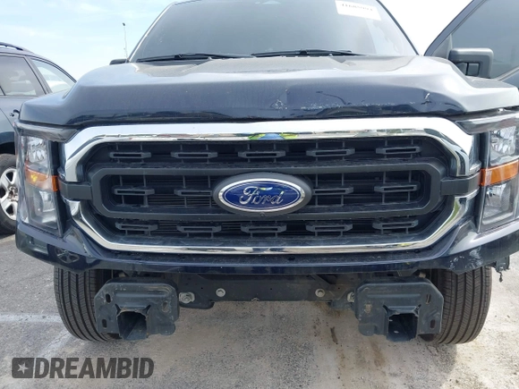 2023 Ford F-150 XL with VIN 1FTMF1C52PKG05729, listed as a IAAI auction lot 41685994 with 12,805 mi miles and . Bid and sale history available at carsss.com. Image 6.