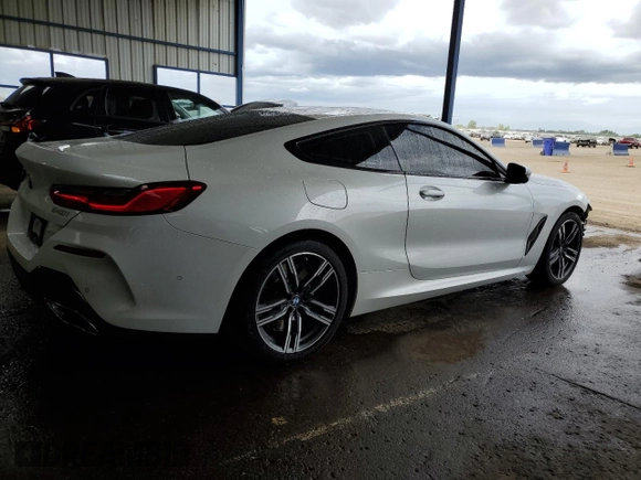 2023 BMW 8 Series 840i with VIN WBAAE4C03PCL64184, listed as a Copart auction lot 59950254 with 23,624 mi miles and Clean Title. Bid and sale history available at carsss.com. Image 3.