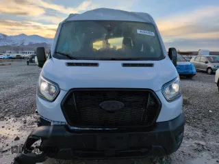 2023 Ford Transit with VIN 1FTBR2DG3PKA80135, listed as a Copart auction lot 46504465 with 21,334 mi miles and Salvage title. Bid and sale history available at DreamBid. Image 5.