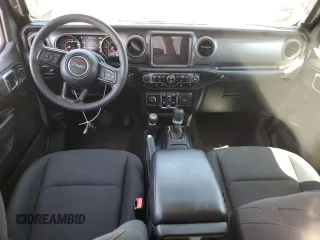 2023 Jeep Gladiator Sport S с VIN 1C6HJTAG3PL552959, выставлен на аукционе Copart как лот 56905635 с пробегом 30 356 миль миль и Списание • Salvage title. История ставок и продаж доступна на DreamBid. Изображение 8.