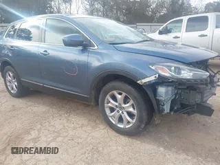 2014 Mazda CX-9 Touring with VIN JM3TB2CA0E0427183, listed as a IAAI auction lot 41734192 with 93,272 mi miles and . Bid and sale history available at carsss.com. Image 1.