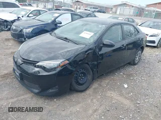2019 Toyota Corolla L with VIN 2T1BURHE9KC236995, listed as a IAAI auction lot 41900101 with 162,810 mi miles. Bid and sale history available at carsss.com. Image 2.