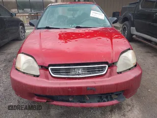 1997 Honda Civic LX with VIN 1HGEJ6672VL019621, listed as a IAAI auction lot 42081226 with 194,957 mi miles. Bid and sale history available at carsss.com. Image 6.