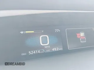 2021 Toyota Prius L Eco with VIN JTDKAMFU6M3137679, listed as a IAAI auction lot 42488129 with 52,414 mi miles and . Bid and sale history available at DreamBid. Image 7.