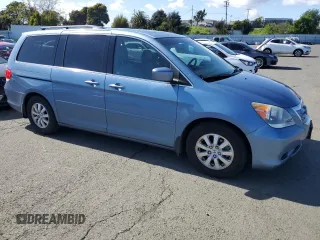 2010 Honda Odyssey EX-L with VIN 5FNRL3H75AB023925, listed as a Copart auction lot 51528745 with 134,982 mi miles and Salvage Title. Bid and sale history available at carsss.com. Image 4.