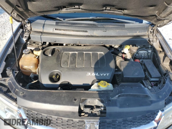 2013 Dodge Journey SXT with VIN 3C4PDCBG4DT618994, listed as a Copart auction lot 62417945 with 205,724 mi miles and Clean title. Bid and sale history available at DreamBid. Image 12.
