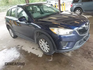 2014 Mazda CX-5 Sport with VIN JM3KE4BEXE0318524, listed as a IAAI auction lot 42538652 with 118,069 mi miles and . Bid and sale history available at DreamBid. Image 1.