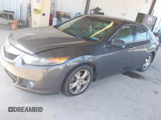 2009 Acura TSX with VIN JH4CU266X9C033090, listed as a IAAI auction lot 42740373 with 200,127 mi miles and . Bid and sale history available at DreamBid. Image 2.