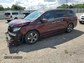 2019 Honda Odyssey Touring z VIN 5FNRL6H84KB070486, wystawiony jako Copart lot #58824205 z przebiegiem 154 464 mil mil oraz Szkoda całkowita • Salvage title. Historia ofert i sprzedaży dostępna na DreamBid. Obrazek 1.