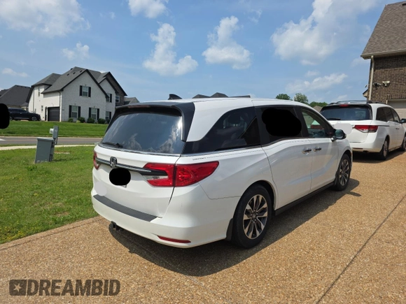 2023 Honda Odyssey EX-L z VIN 5FNRL6H67PB013527, wystawiony jako Copart lot #59705385 z przebiegiem 12 262 mil mil oraz Czysty tytuł • Clean title. Historia ofert i sprzedaży dostępna na DreamBid. Obrazek 4.