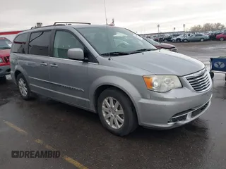 2013 Chrysler Town & Country Touring z VIN 2C4RC1BG8DR743337, wystawiony jako IAAI lot #41110287 z przebiegiem 139 040 mil mil oraz . Historia ofert i sprzedaży dostępna na DreamBid. Obrazek 1.