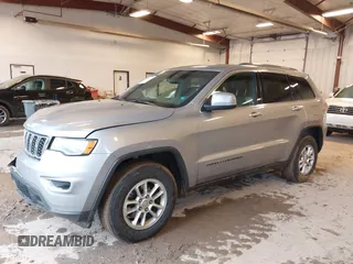 2019 Jeep Grand Cherokee Laredo E with VIN 1C4RJFAG8KC823814, listed as a IAAI auction lot 41728782 with 120,695 mi miles. Bid and sale history available at carsss.com. Image 2.