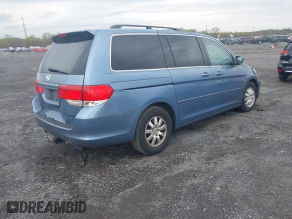 2008 Honda Odyssey EX-L with VIN 5FNRL38748B038328, listed as a IAAI auction lot 42028968 with 243,185 mi miles. Bid and sale history available at carsss.com. Image 4.