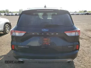 2021 Ford Escape Titanium Hybrid с VIN 1FMCU9DZ2MUA10439, выставлен на аукционе Copart как лот 58440785 с пробегом 84 803 миль миль и Списание • Salvage title. История ставок и продаж доступна на DreamBid. Изображение 6.