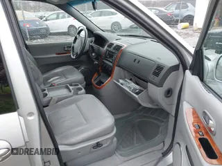 2004 Kia Sedona LX with VIN KNDUP131546535352, listed as a IAAI auction lot 41856784 with 128,943 mi miles. Bid and sale history available at carsss.com. Image 5.
