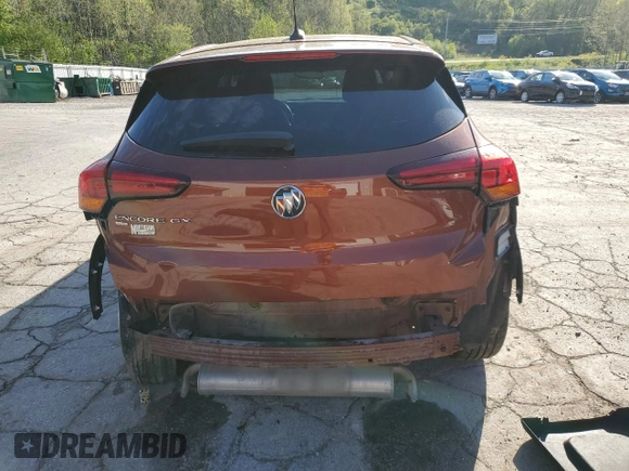2021 Buick Encore GX Preferred с VIN KL4MMCSL5MB141259, выставлен на аукционе Copart как лот 54479185 с пробегом 56 937 миль миль и Списание • Salvage title. История ставок и продаж доступна на DreamBid. Изображение 6.