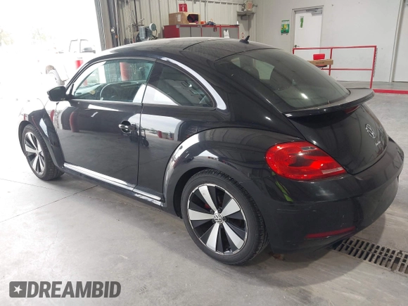 2012 Volkswagen Beetle 2.0T Turbo w/Sun/Snd/Nav PZEV with VIN 3VWVA7AT8CM617830, listed as a IAAI auction lot 42024546 with 91,688 mi miles. Bid and sale history available at carsss.com. Image 3.