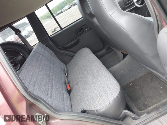 2000 Jeep Cherokee with VIN 1J4FF48SXYL148361, listed as a IAAI auction lot 42786017 with 159,908 mi miles and . Bid and sale history available at DreamBid. Image 8.