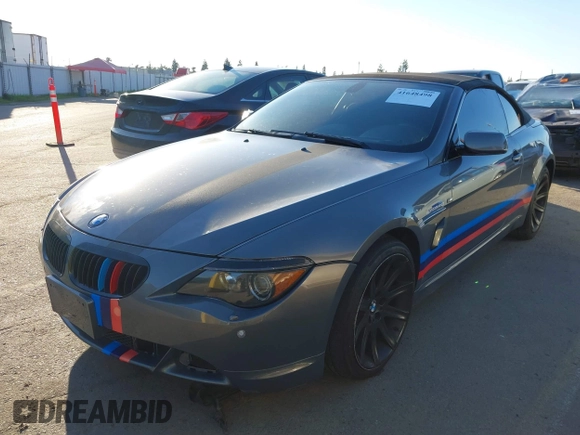 2006 BMW 6 Series 650Ci z VIN WBAEK13416CN77872, wystawiony jako IAAI lot #41648498 z przebiegiem 142 598 mil mil oraz . Historia ofert i sprzedaży dostępna na DreamBid. Obrazek 2.