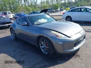 2013 Nissan 370Z with VIN JN1AZ4EH1DM880983, listed as a IAAI auction lot 41937876 with 130,613 mi miles. Bid and sale history available at carsss.com. Image 1.