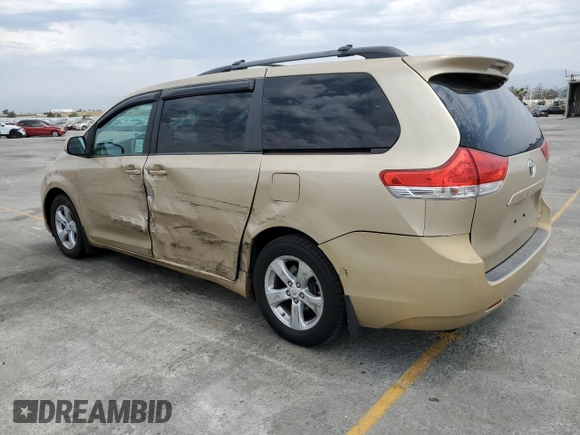 2012 Toyota Sienna LE AAS with VIN 5TDKK3DC5CS227808, listed as a Copart auction lot 57984515 with 103,656 mi miles and Salvage title. Bid and sale history available at DreamBid. Image 2.