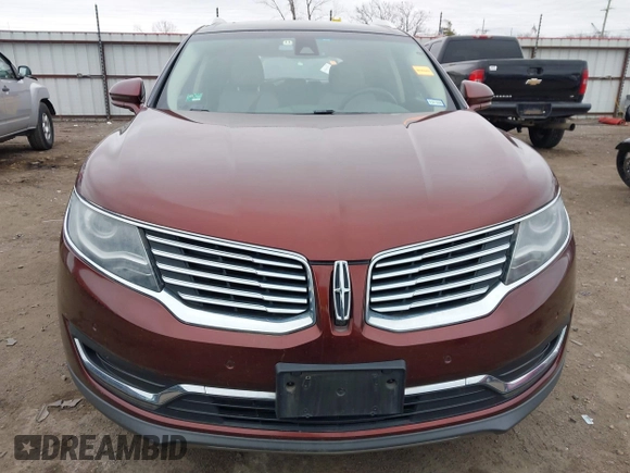 2016 Lincoln MKX Reserve z VIN 2LMPJ6LP0GBL42595, wystawiony jako IAAI lot #41248786 z przebiegiem 99 895 mil mil oraz . Historia ofert i sprzedaży dostępna na DreamBid. Obrazek 13.