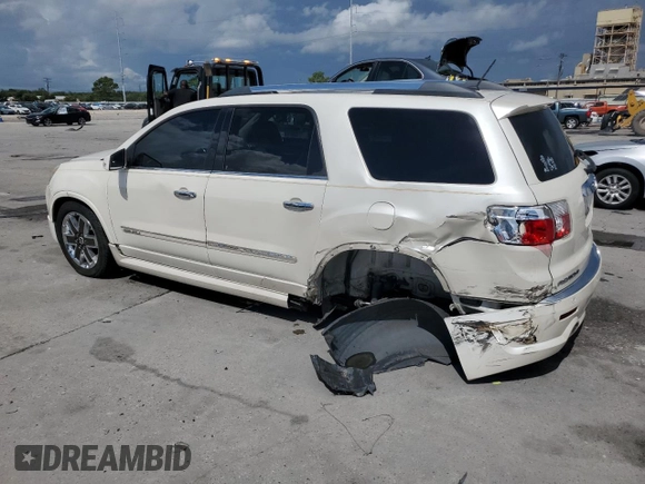 2012 GMC Acadia Denali with VIN 1GKKVTED7CJ335248, listed as a Copart auction lot 69451384 with 124,641 mi miles and Salvage Title. Bid and sale history available at carsss.com. Image 2.