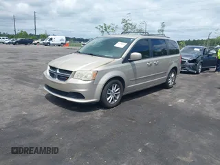 2014 Dodge Grand Caravan SXT z VIN 2C4RDGCG1ER182396, wystawiony jako IAAI lot #42148810 z przebiegiem 121 056 mil mil oraz . Historia ofert i sprzedaży dostępna na DreamBid. Obrazek 2.